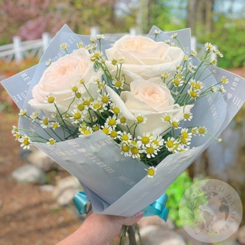 Букет из роз и ромашек в магазине Цветы Планеты